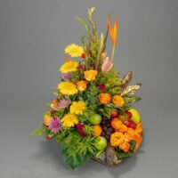 Diseño flores y frutas en canasta san jose