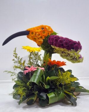 colibri con flores