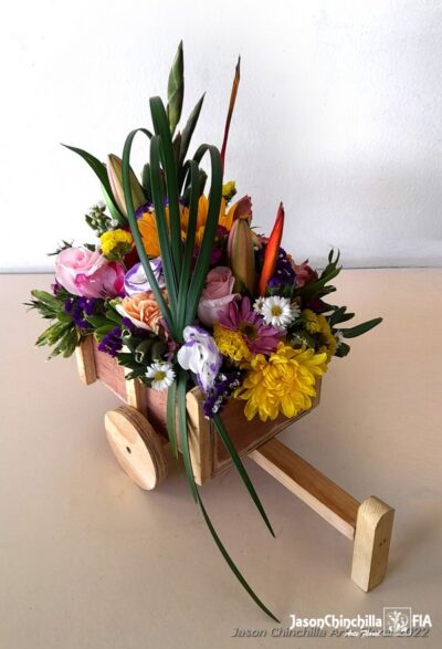 Carreta con flores variadas
