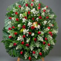 Medallón fúnebre de rosas