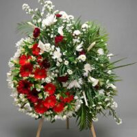 Corona funebre con tributo