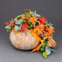 calabaza halloween centro de mesa flores